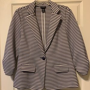 Women’s blue and white striped stretchy suit style jacket.